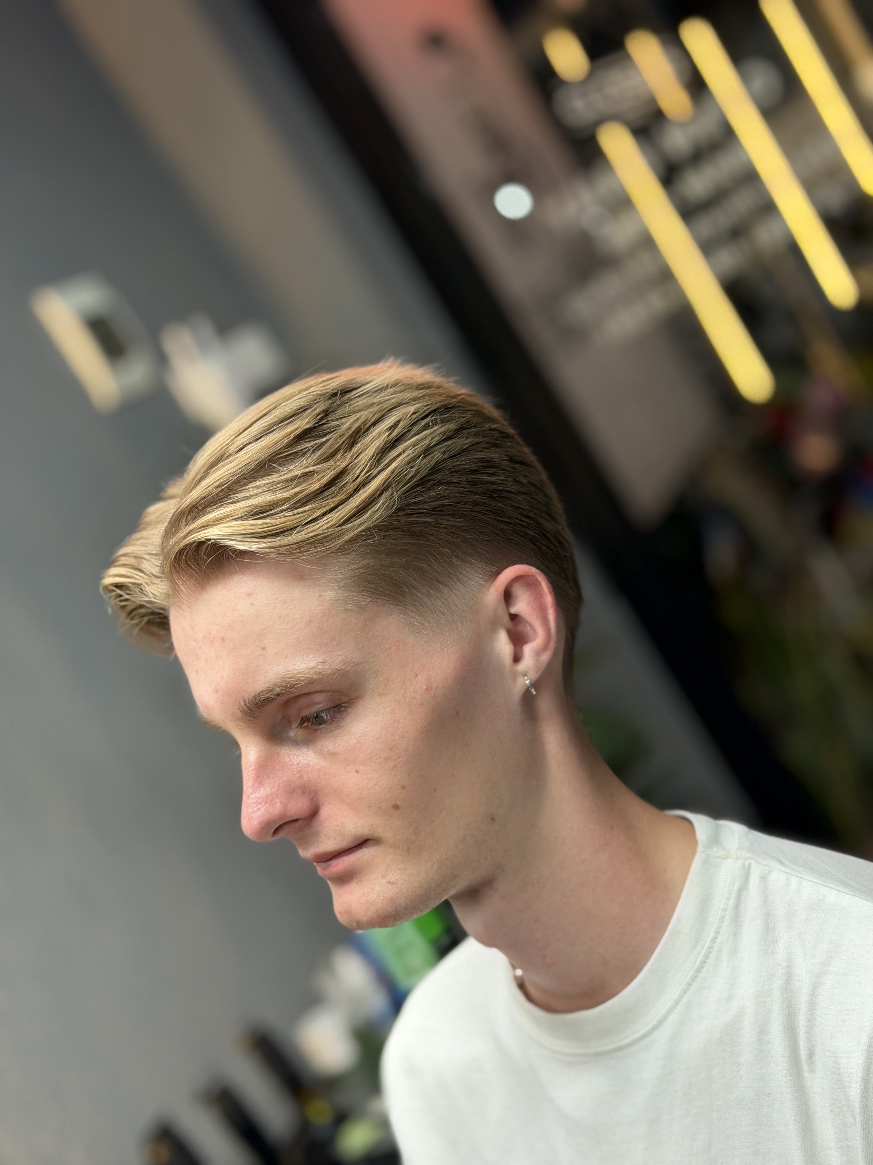 Classic side part haircut by Triple Line Barbershop